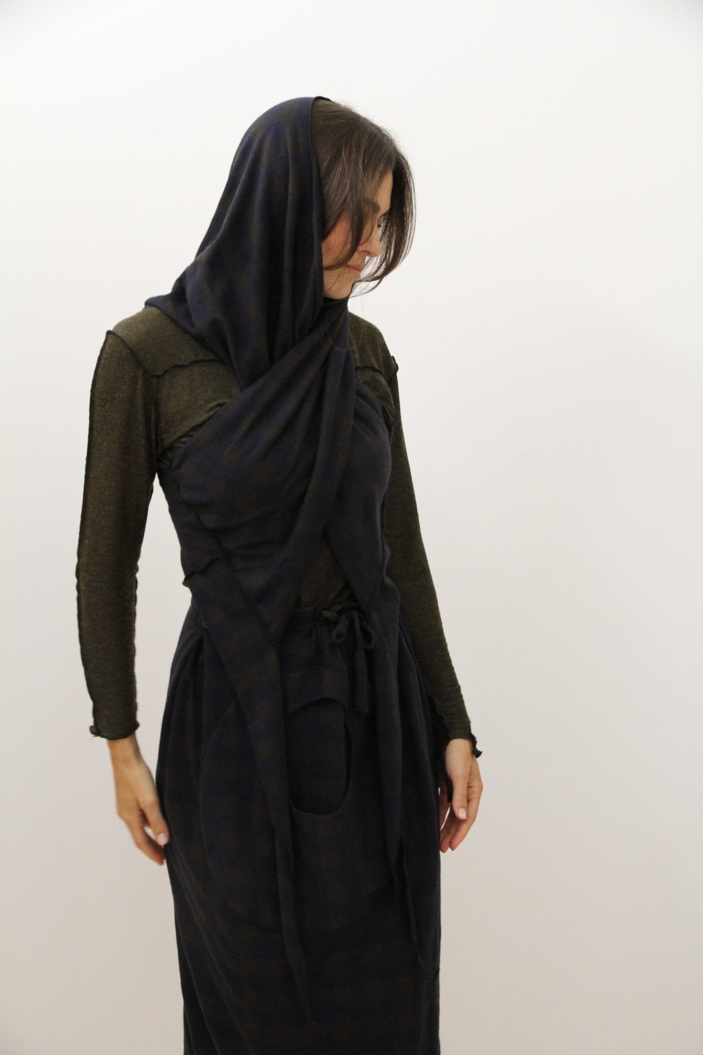 Cape vest with a hood